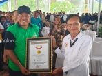 Bupati Alfedri Terima Rekor Muri