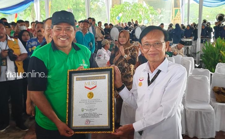 Bupati Alfedri Terima Rekor Muri